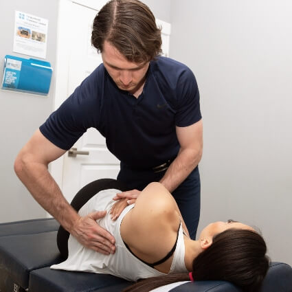 Female patient back adjustment