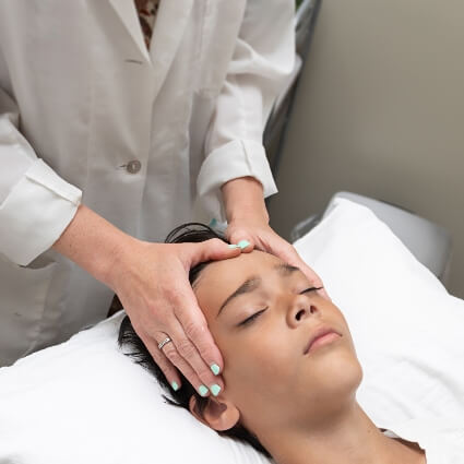 Female patient head massage