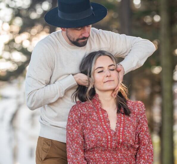 Dr. Austin adjusting female patient's neck