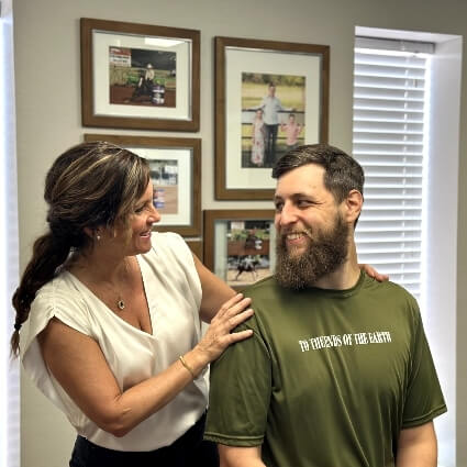 Dr Courtney talking with patient