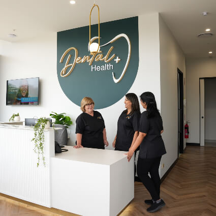 Ladies behind reception desk