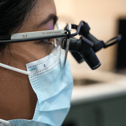 Dentist wearing binoculars