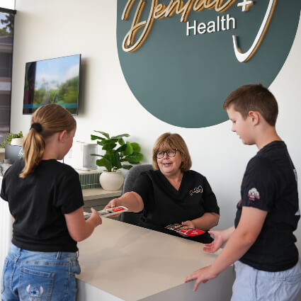 Receptionist with patients