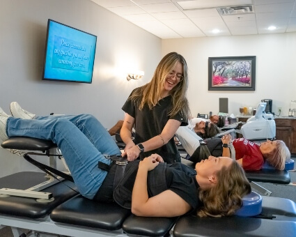 The Colony patient undergoing Lumbar Traction treatment