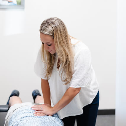 Dr. Danielle adjusting lower back