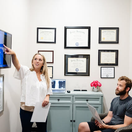 Dr Danielle pointing to screen