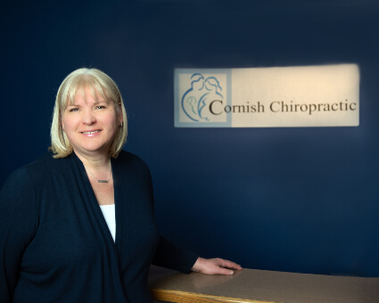 Yorkville chiropractor Dr. Cornish at front desk