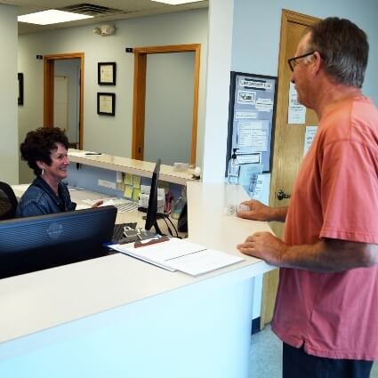 patient checking in at our front desk