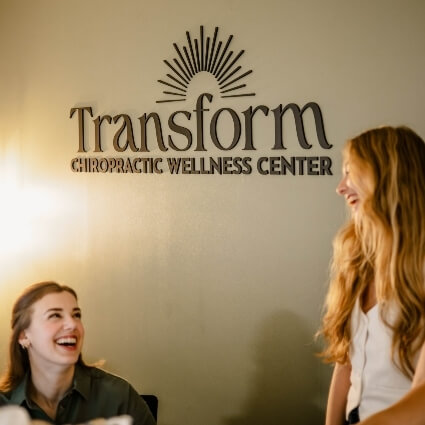 front desk team smiling