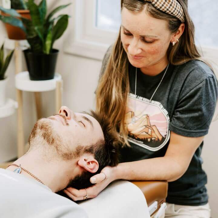 man getting neck adjustment