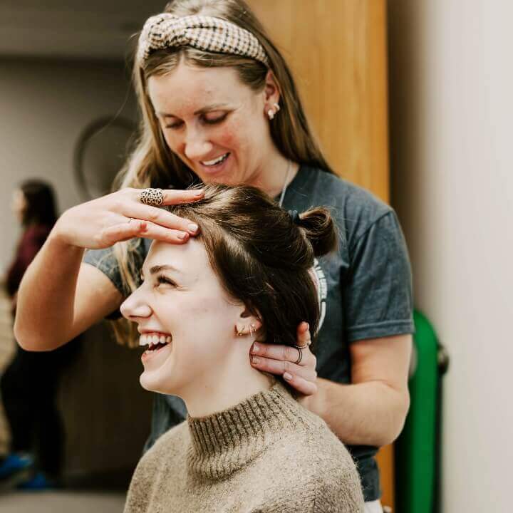 woman laughing while getting adjustment