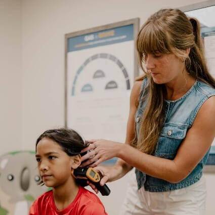 child having neck scanned