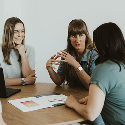 practitioners discussing treatment plan