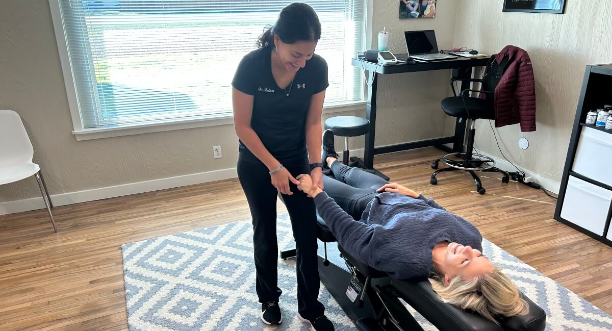 Roanoke chiropractor Dr. Roberts of Essentials for Wellness Family Chiropractic giving an adjustment