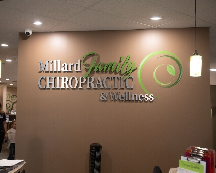 Millard Family Chiropractic & Wellness reception board