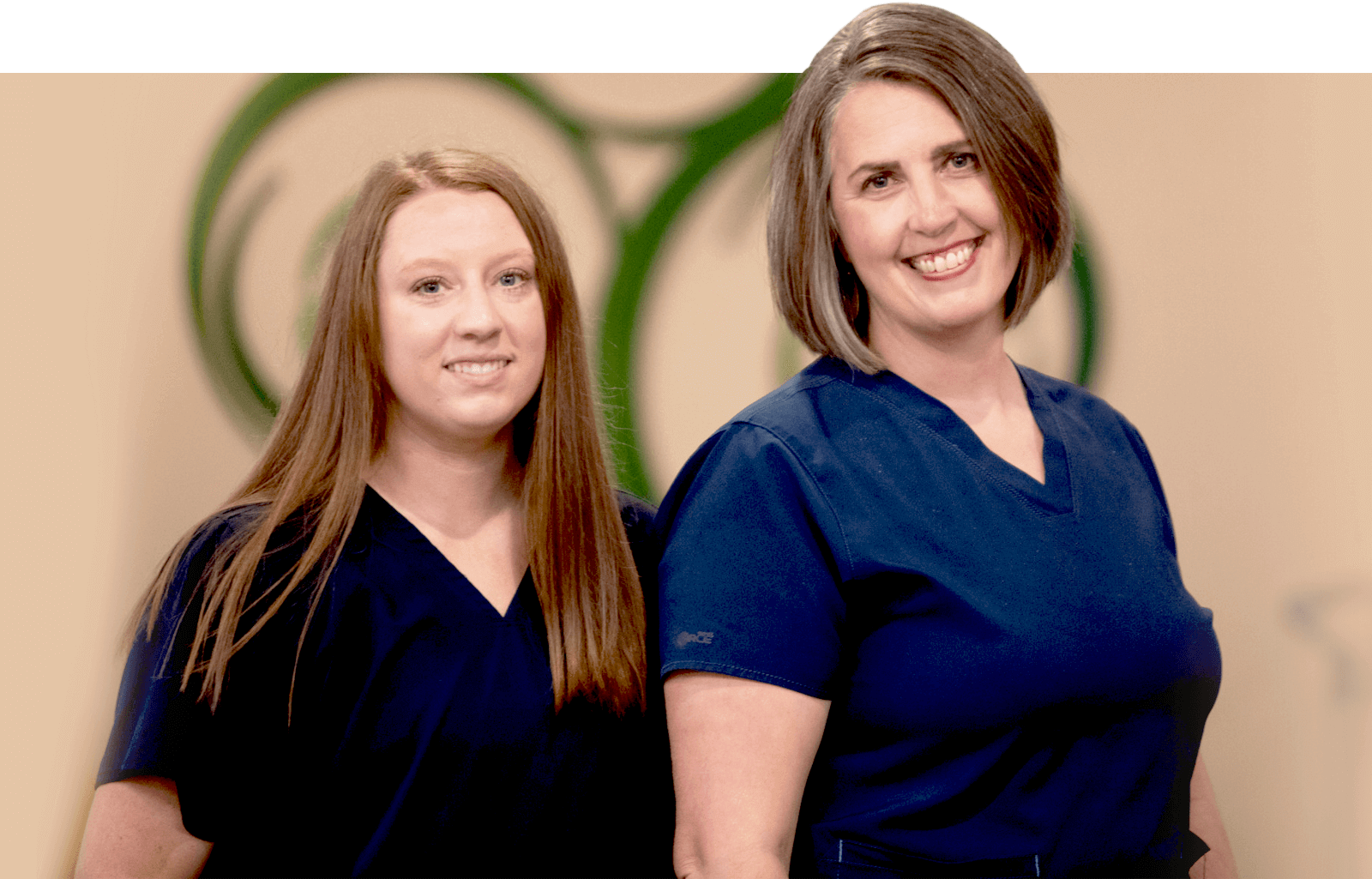 Omaha chiropractors Dr. Taylor Koch and Dr. Sheri Millard of Millard Family Chiropractic & Wellness