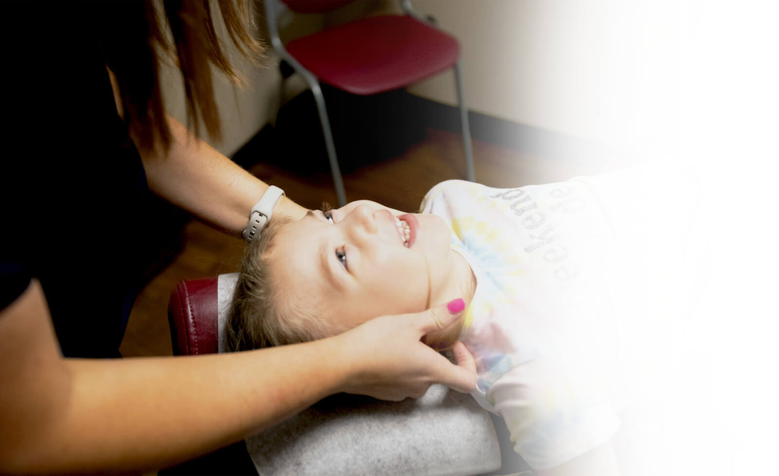 Omaha pediatric patient neck adjustment at Millard Family Chiropractic & Wellness