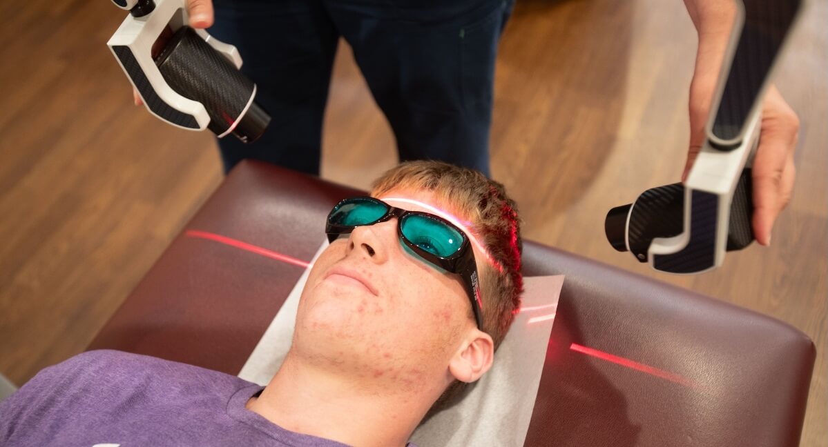 Omaha patient receiving laser therapy treatment 