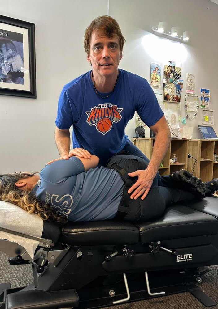 Summerville Chiropractor Dr. Mike adjusting patient