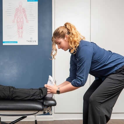 patient having foot adjusted