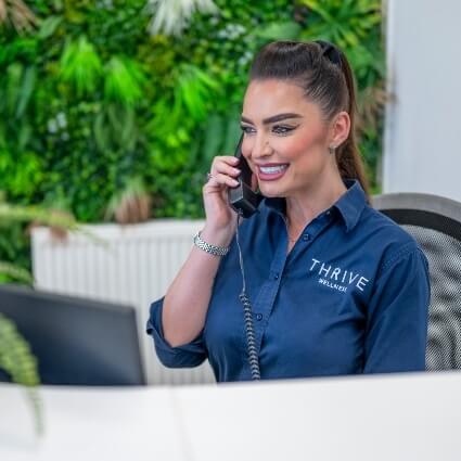 staff member on the phone