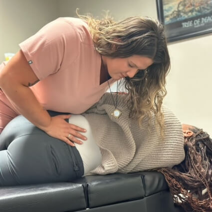 Philadelphia Chiropractor Dr. Haley adjusting woman