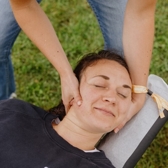 Cook Chiropractic Center practitioner adjusting patients neck