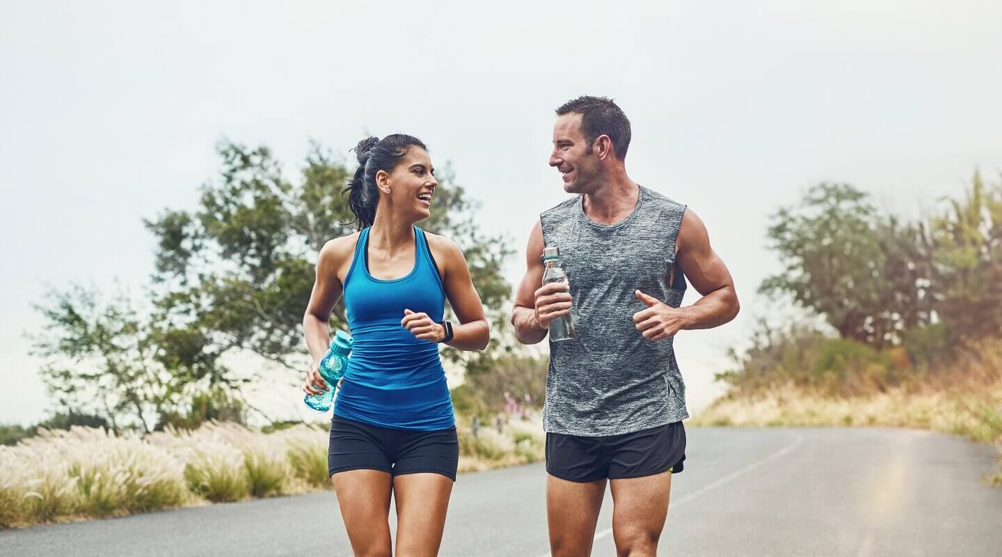 couple running while talking