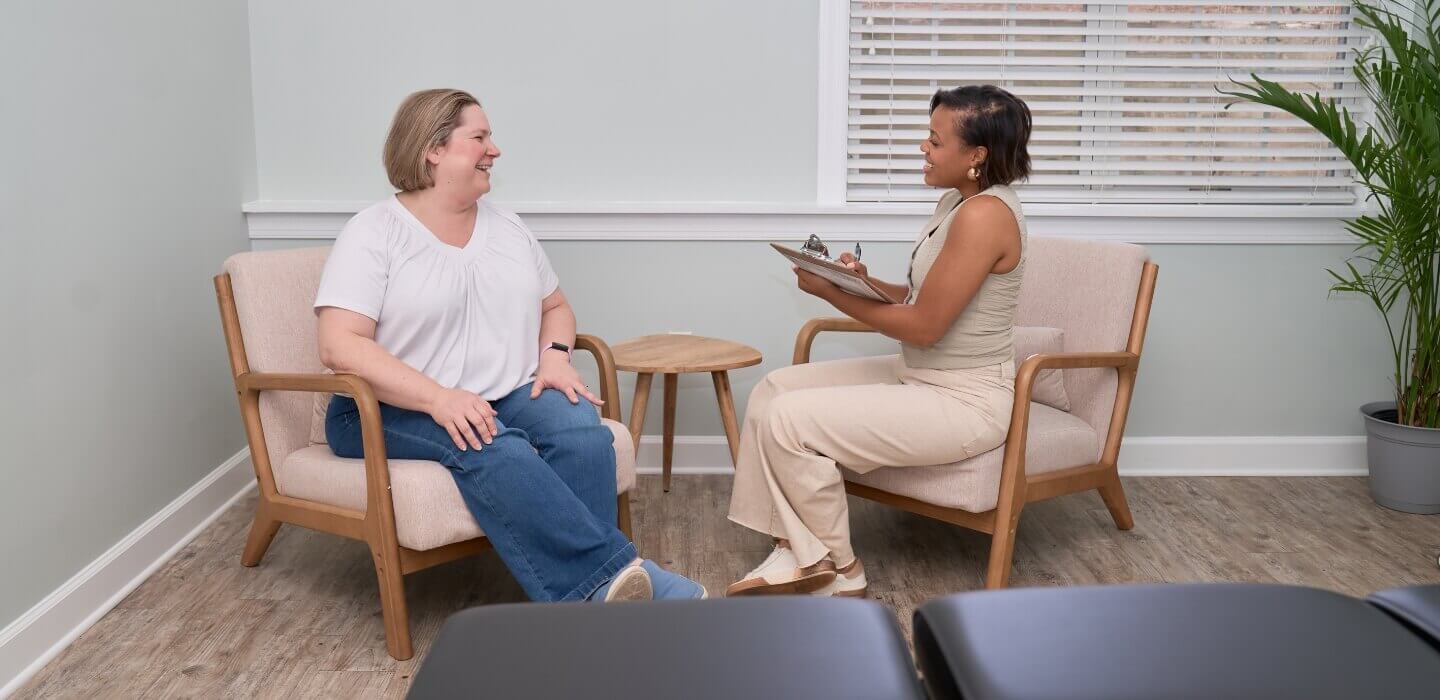 Cumming chiropractor Dr Tiffany laughing with patient