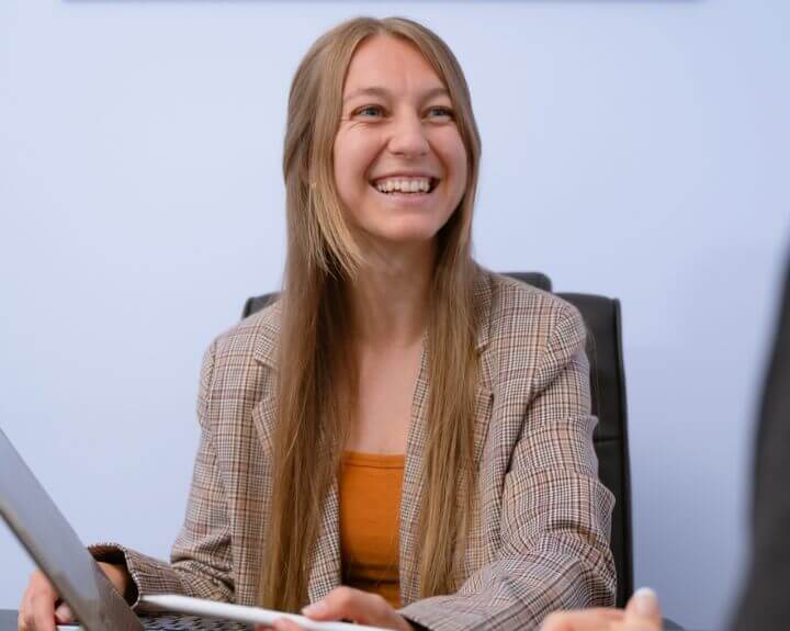 City Chiropractic's Dr Nicole smiling at patient