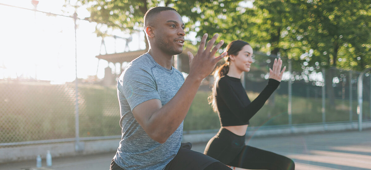 two people working out outdoor