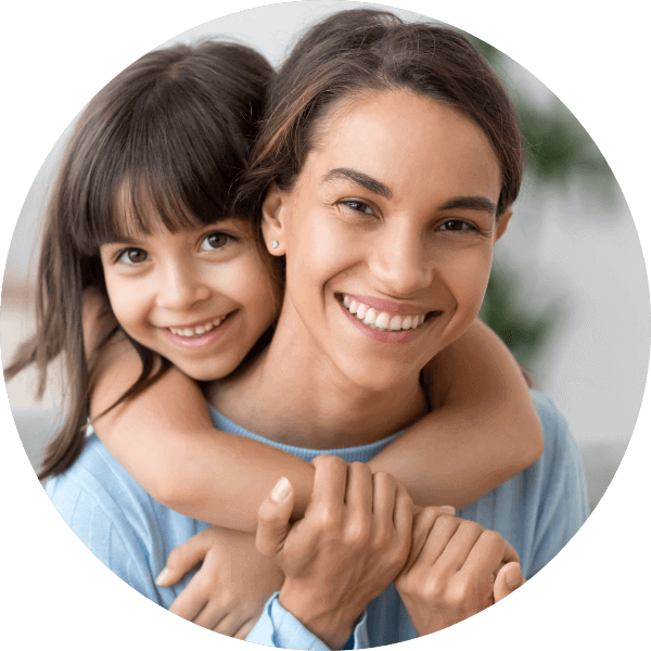 mother and daughter smiling