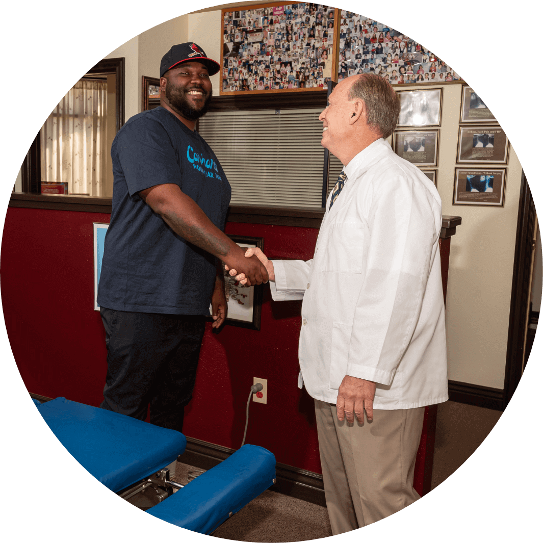 Power Inn Chiropractic Chiropractor Dr. Hulbert shaking patient's hand