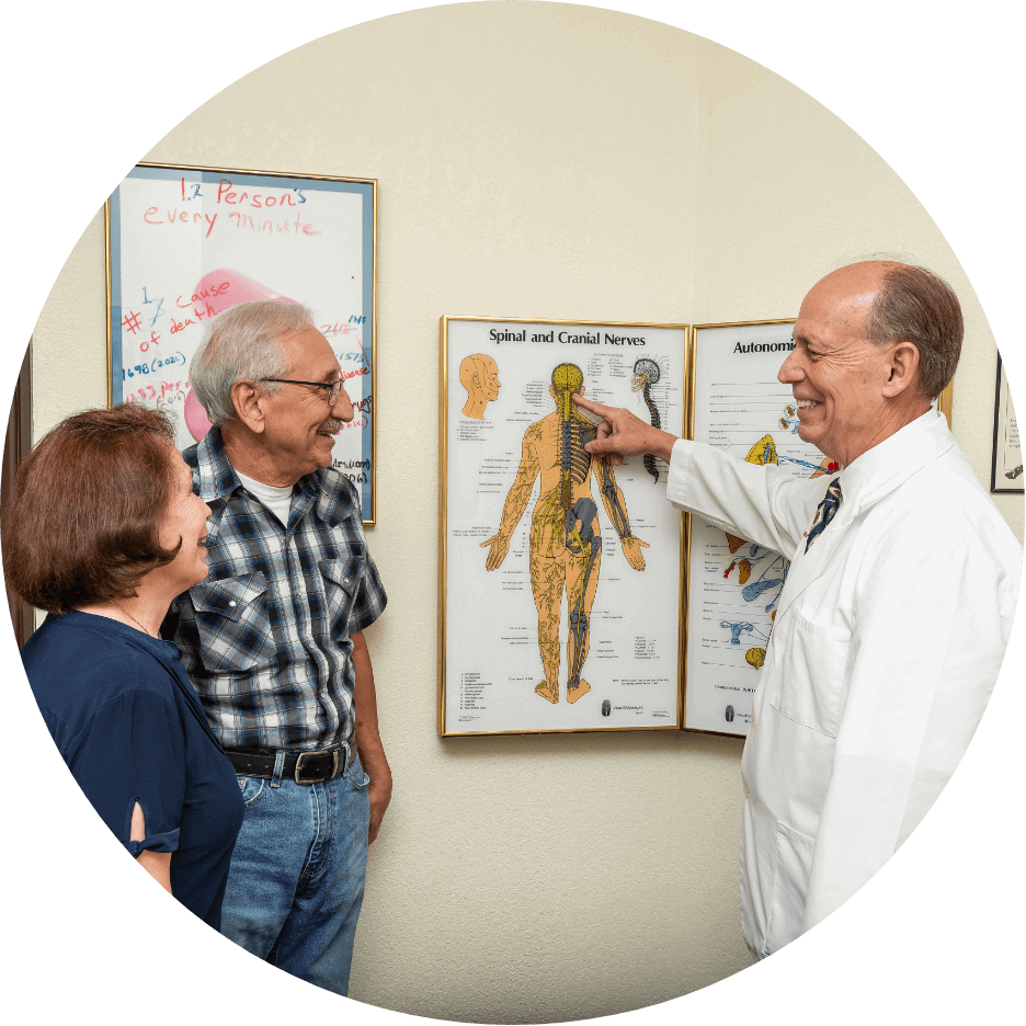 Dr. Hulbert pointing to spine illustration