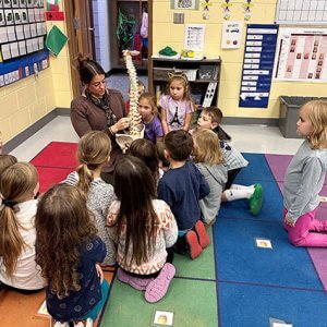 Kids listening to teach