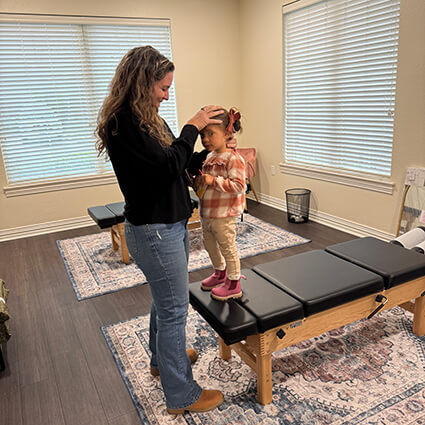 Dr Sarah head pressure child patient