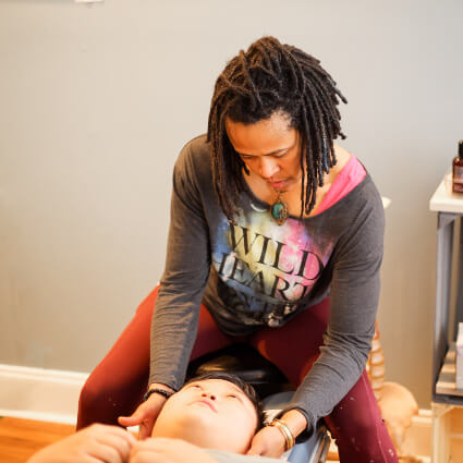 Doctor checking neck alignment