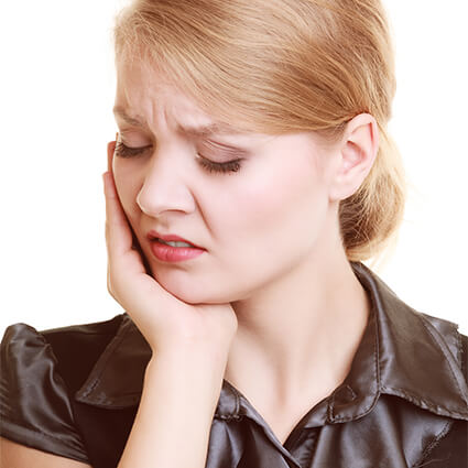 woman holding jaw