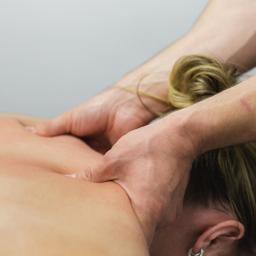 patient having back massaged