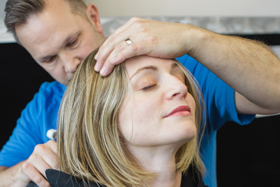 Dr. Danny adjusting patient