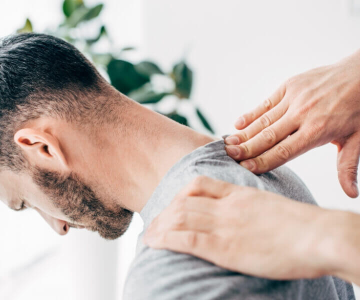 person having neck adjusted