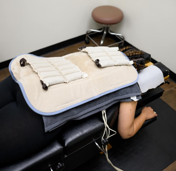 person having back adjusted