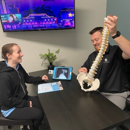 Patient in consultation at ChiroPro