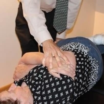 Beacon Hill Chiropractic Clinic patient having back adjusted