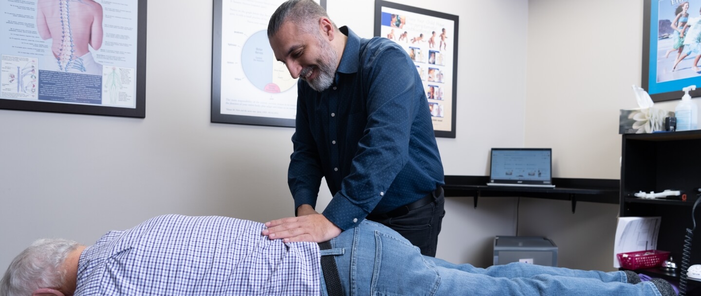 Orillia chiropractor Dr Leon adjusting patients lower back