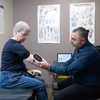 Restore Chiropractic & Wellness Centre patient having test done on arm