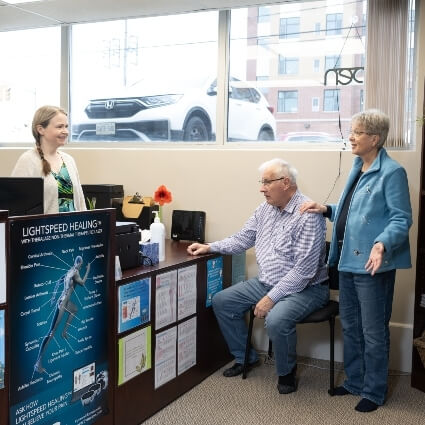 Restore Chiropractic & Wellness Centre patients at our front desk