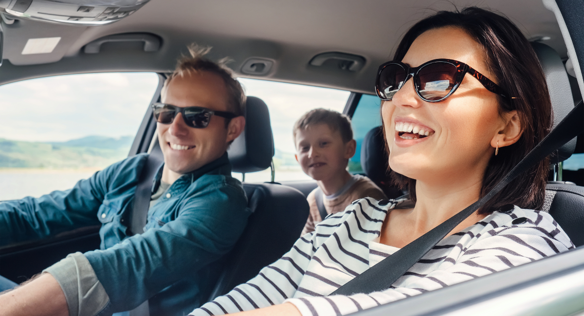 Family travelling in a car
