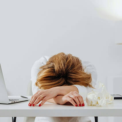 Sick-Woman-at-Her-Desk