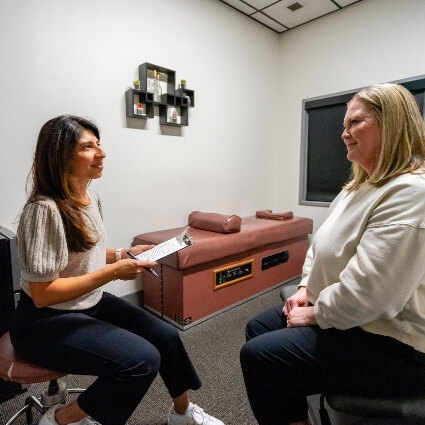 Dr Safina talking to patient